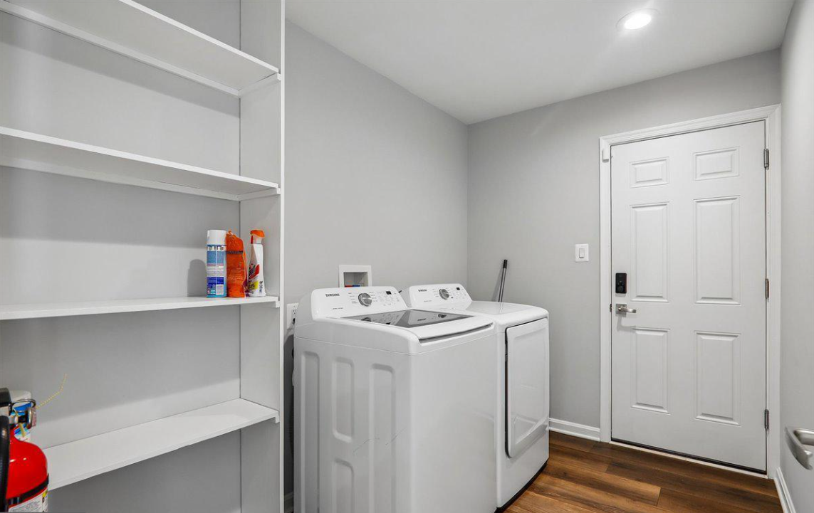 On-site laundry room with full-size washer and dryer